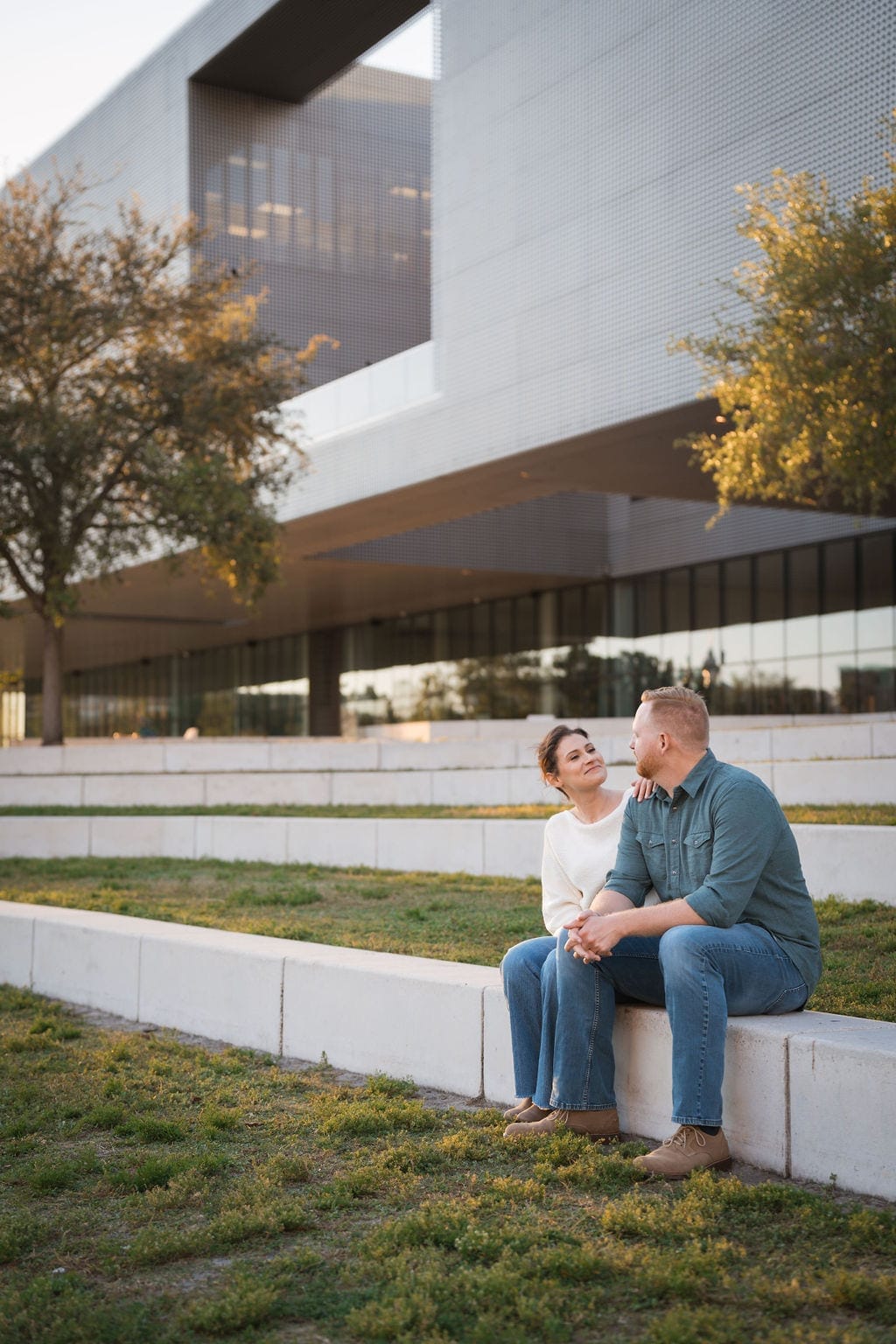 Couple sitting on museum steps modern architecture Tampa