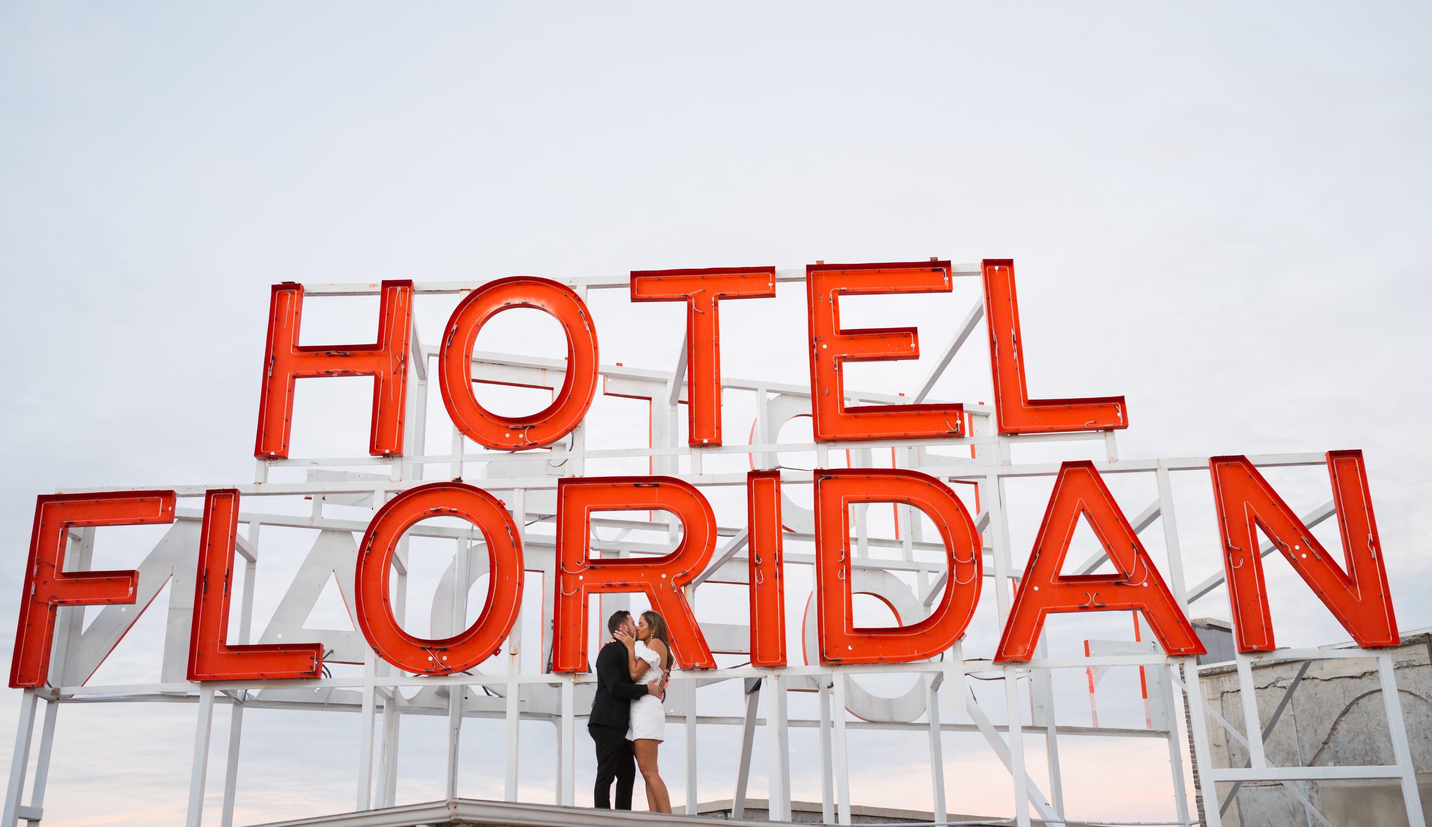 Couple kiss hotel floridan sign downtown tampa