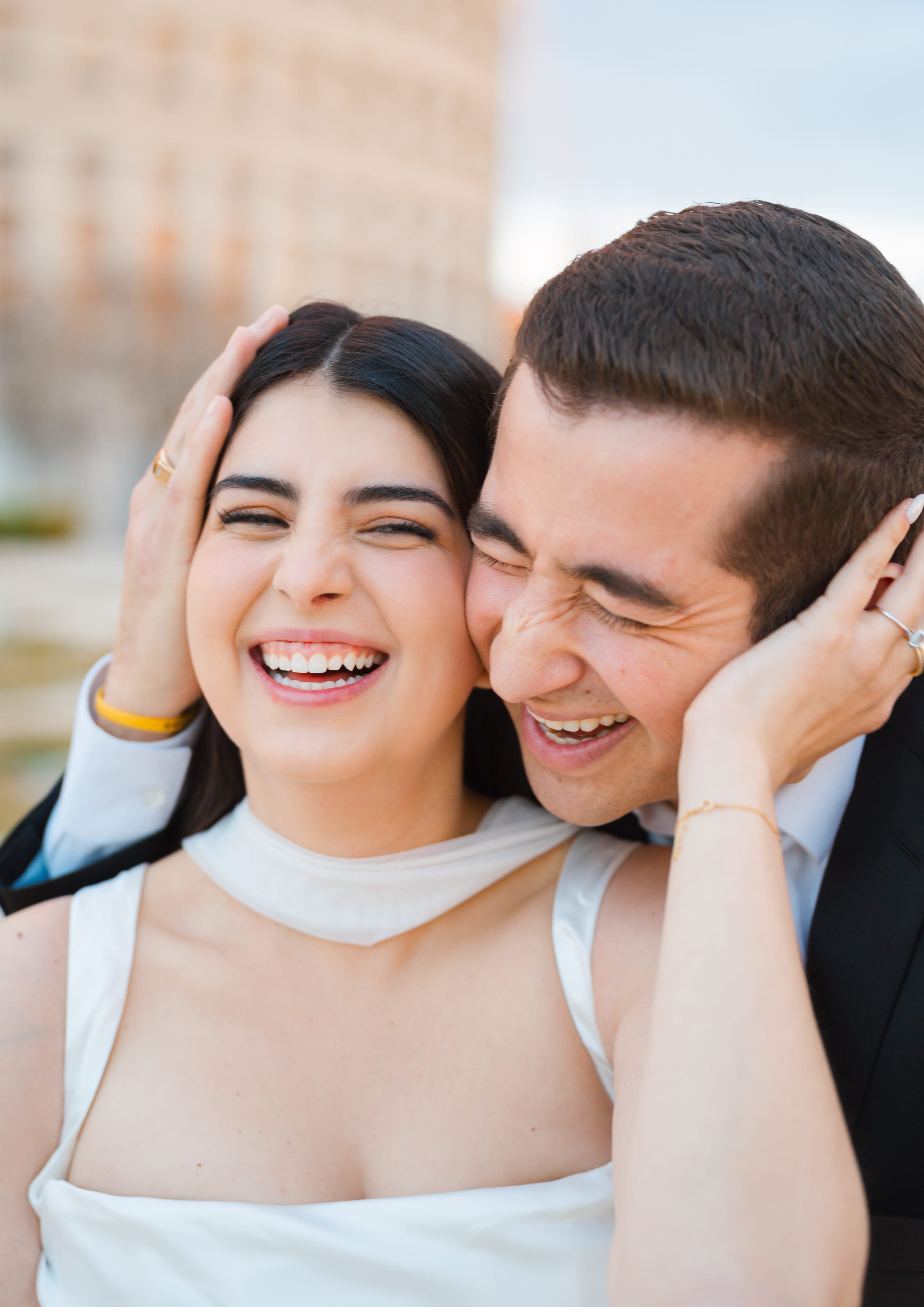 Cheek to cheek laughing closeup