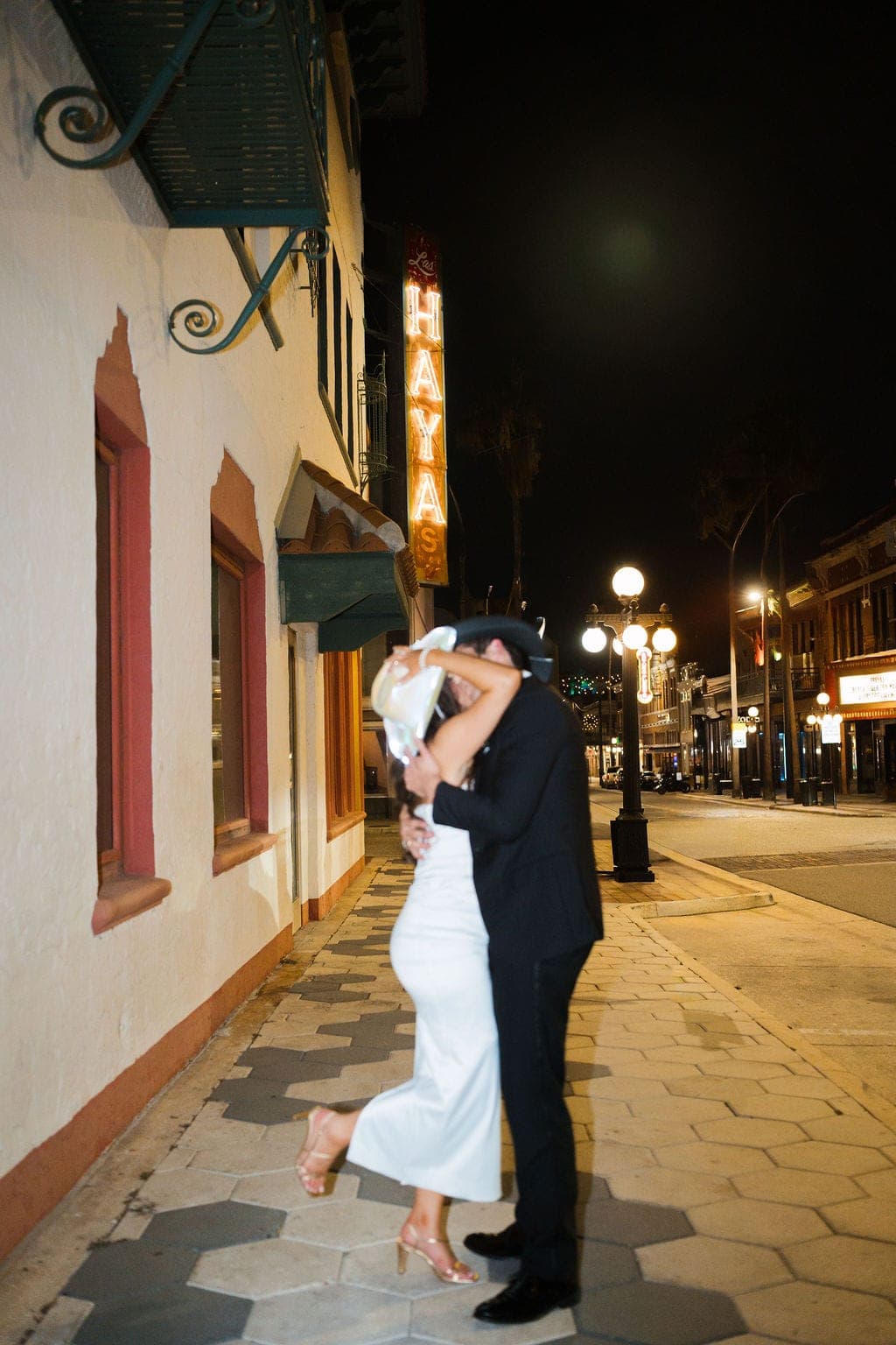 Ybor City Engagement Photos: Brick Streets, Neon, and Roosters