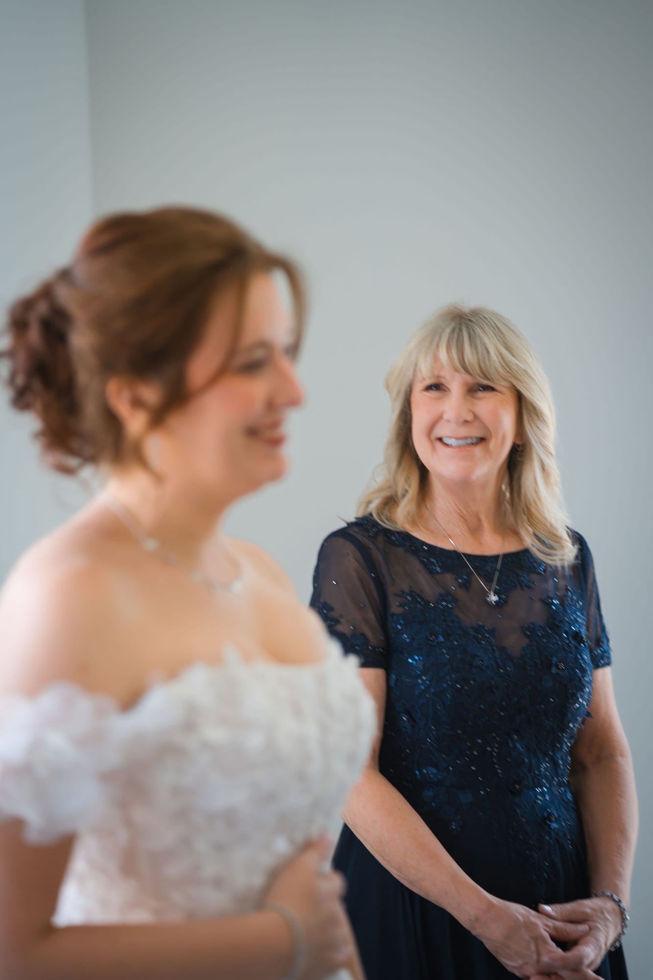 Bride with her mother in a quiet moment before the ceremony