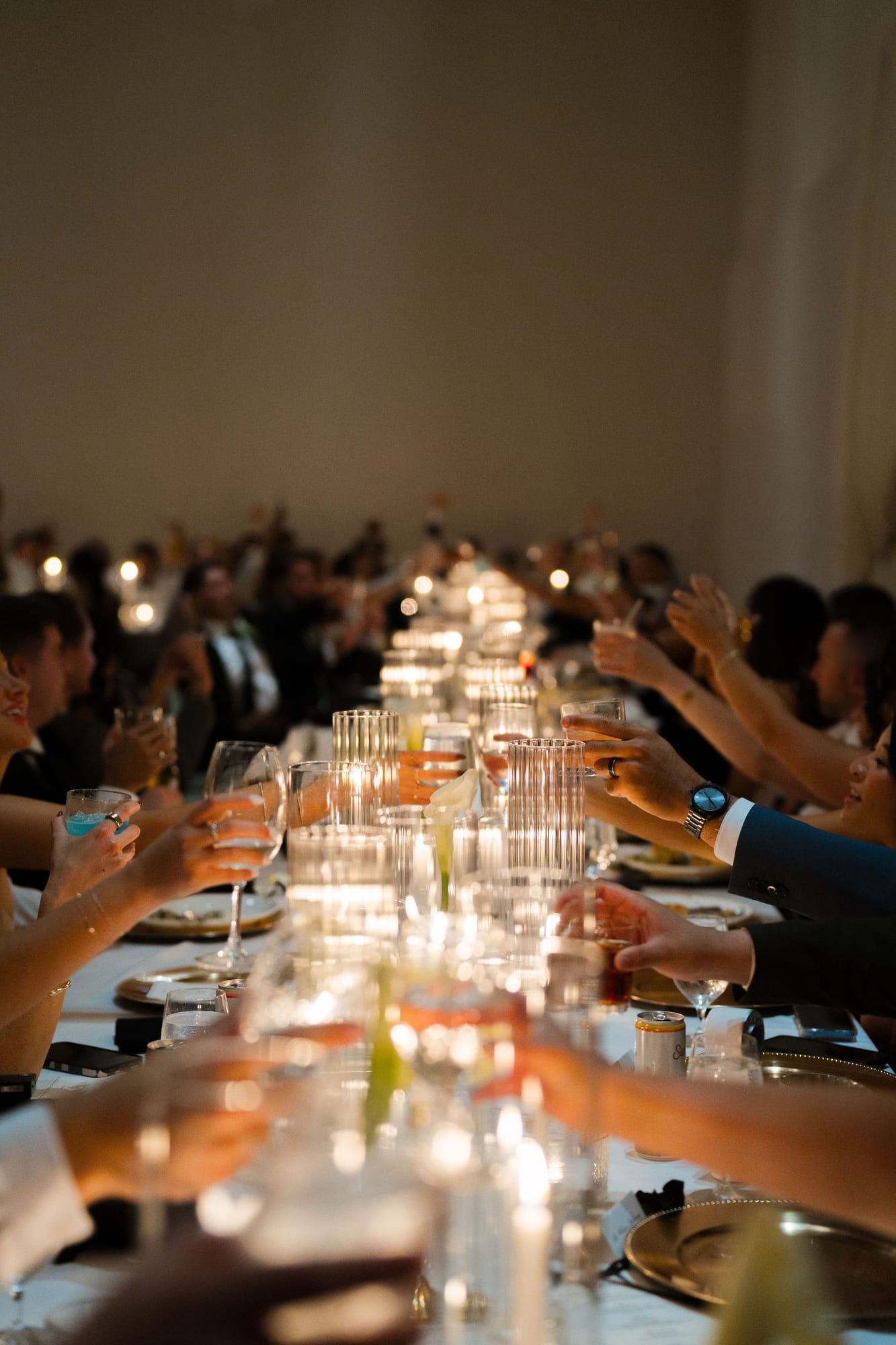 Candlelit long table at a wedding reception in the Tampa area