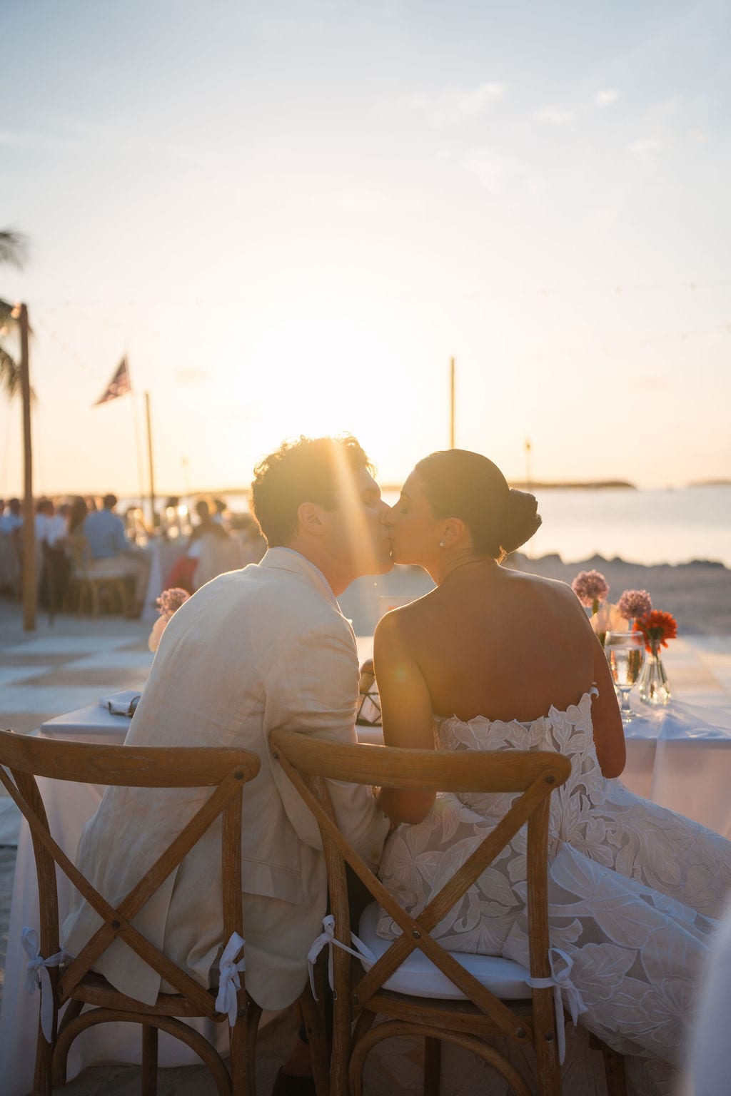 Sweetheart table at a beach reception during sunset in the Tampa Bay area