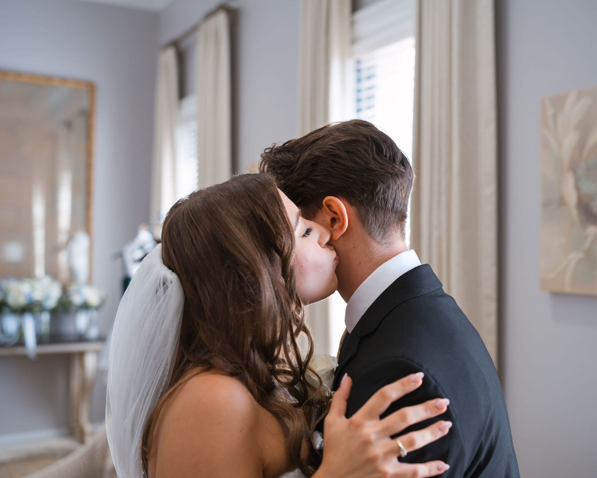 Bride sharing a quiet moment with her brother on the morning of the wedding
