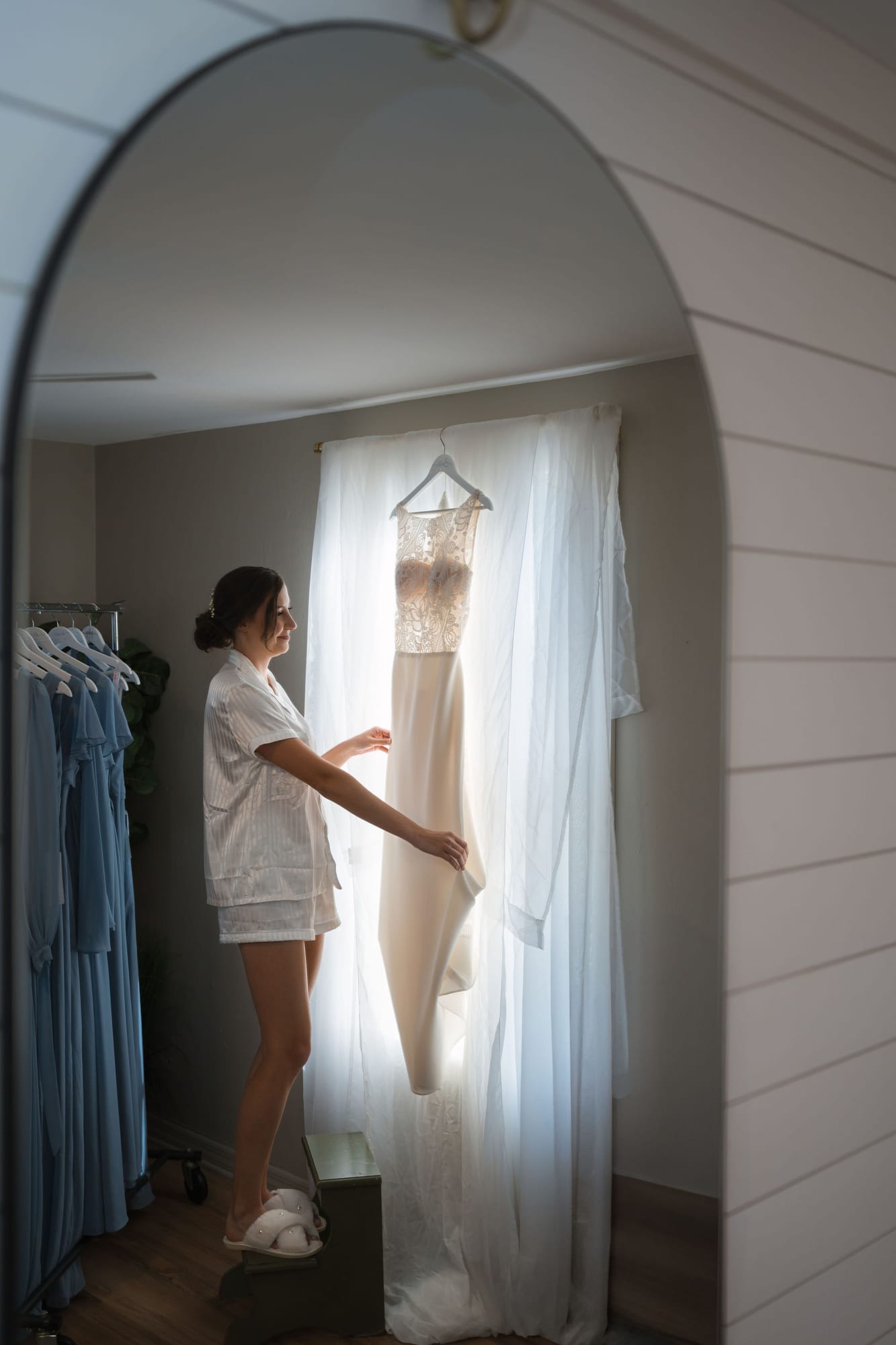 Wedding dress hanging in the bridal suite at SoireEstate